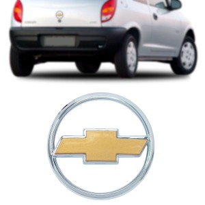 EMBLEMA (GRAVATA)  CELTA 01/05 - DOURADO E CROMADO (PORTA MALAS)