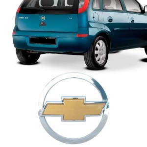 EMBLEMA (GRAVATA) CORSA HATCH 06/12 DOURADO/CROMADO (PORTA MALAS)
