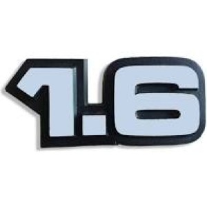 EMBLEMA (1.6) GM CHEVETTE 83/91 CINZA COM FUNDO PRETO