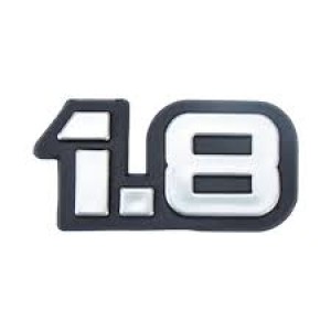 EMBLEMA (1.8) FORD ESCORT/ VERONA/ DEL REY/ PAMPA 83/94 CINZA COM FUNDO PRETO