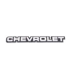 EMBLEMA (CHEVROLET) CHEVETTE/CARAVAN 82/90 CINZA COM FUNDO PRETO